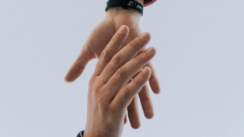 view of two persons hands