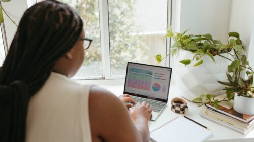 a woman using a laptop