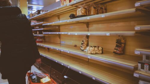 brown and white bread on display counter